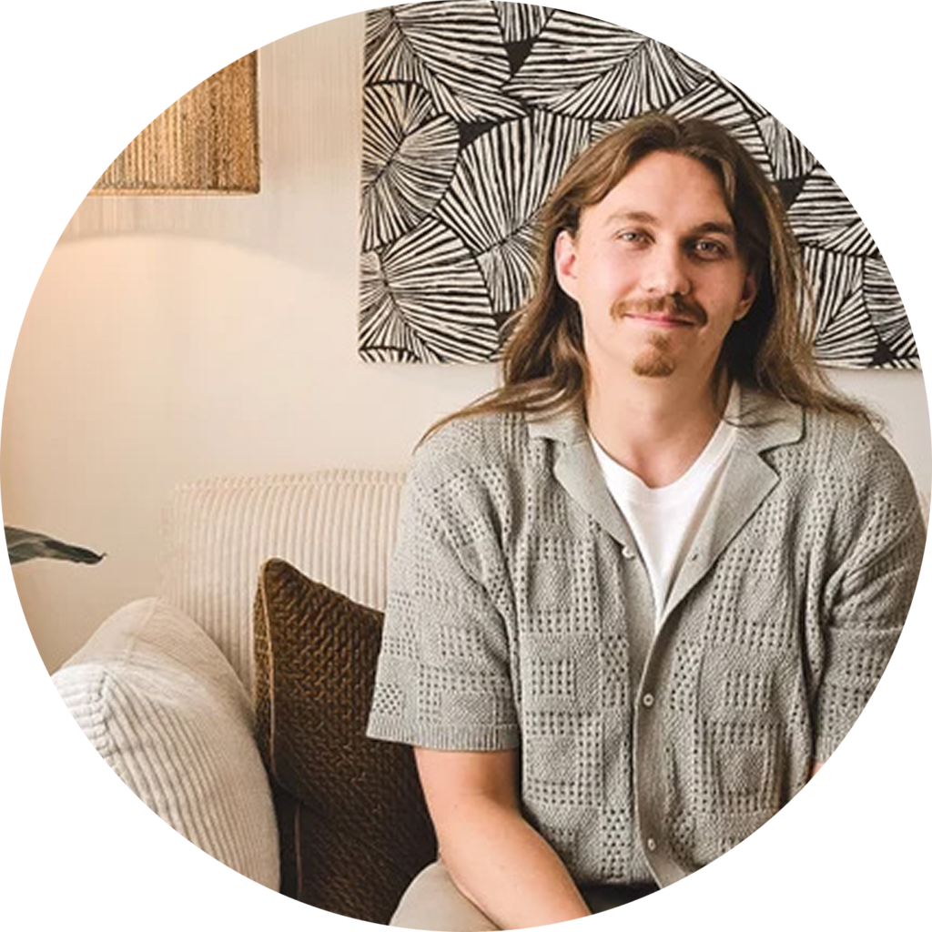 Man smiling during a counselling session at Stone Silo Wellness.