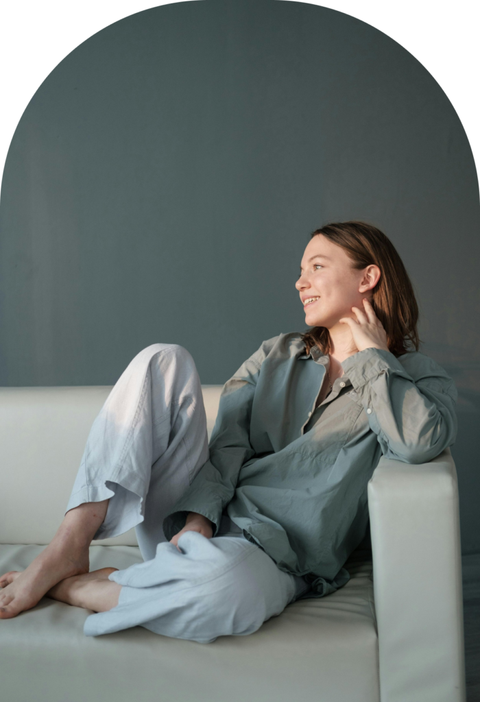 Woman smiling during therapy session at Stone Silo Counselling & Wellness.